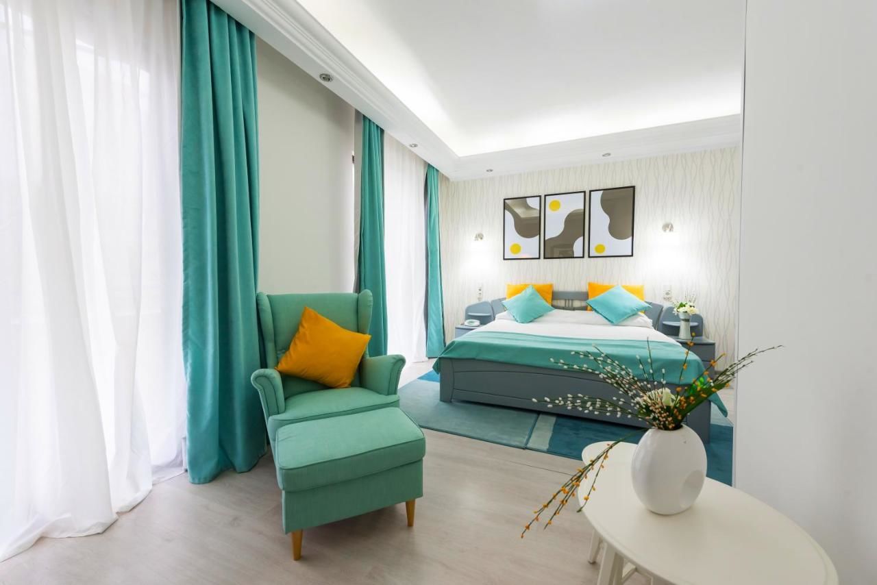 Отель Relax Comfort Suites Hotel Бухарест